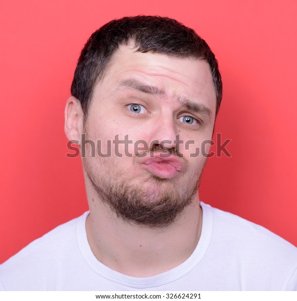 Portrait Man Funny Face Against Red Stock Photo 326624291 | Shutterstock