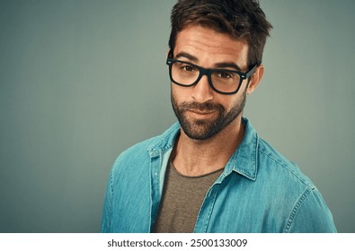 Portrait, man and glasses in studio for vision, prescription and confidence with pride for clear eyesight. Product, eyewear frame and male person with spectacle for eye care and gray background - Powered by Shutterstock