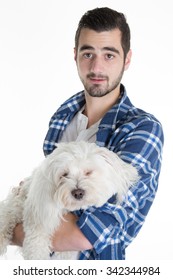 Portrait Of A Man Holding A White Dog Maltese Bichon Isolated Over White.