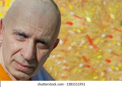 Portrait Of A Man With Just Shaved Head, Outdoor Shot With Yellow Background