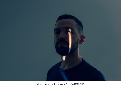 Portrait Of A Man With Leak Of Light