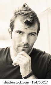 Portrait of man looking at the camera.