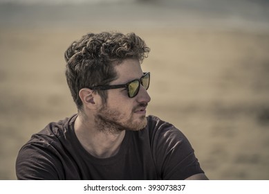 portrait of a man on the beach