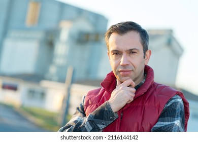 Portrait Of Man Outside Factory