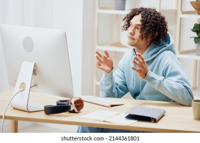 portrait of a man sitting in front of the computer internet online Lifestyle