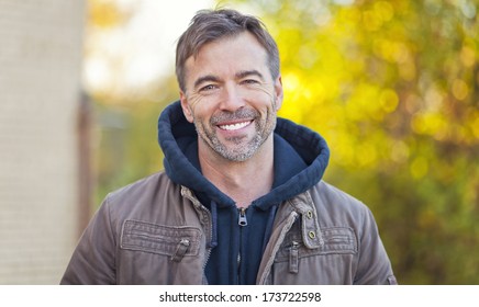 Portrait Of A Man Smiling At The Camera 