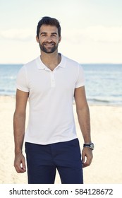 Portrait Of Man Smiling On Beach