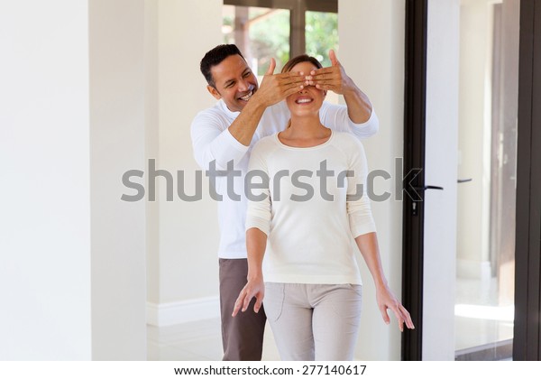 Portrait Man Surprise His Wife New Stock Photo (Edit Now) 277140617 image