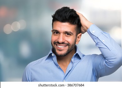 Portrait Of A Man Touching His Hair