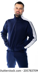 portrait of a man in a tracksuit. man looks at us. isolated white background