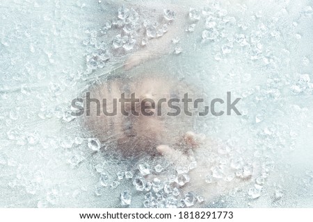 portrait of man trapped under ice