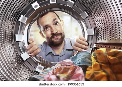 Portrait Of Man View From Washing Machine Inside