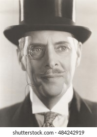 Portrait Of Man Wearing Monocle And Top Hat