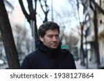 
portrait of man in winter in the street