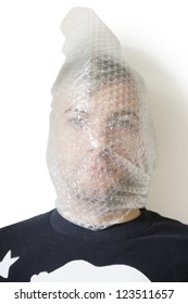 Portrait Of Man Wrapped In Bubble Wrap