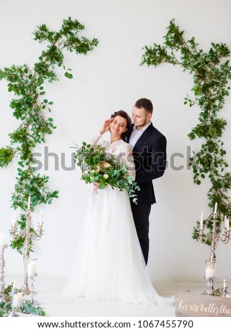 Portrait of married couple. white background