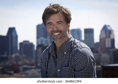 Portrait Of A Mature Active Man Smiling In A City