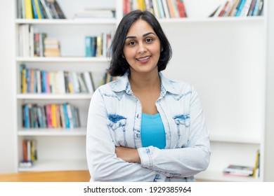 Portrait Of Mature Adult Hispanic Woman Indoors At Home