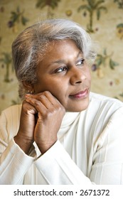 Portrait Of Mature African American Woman Looking To The Side.