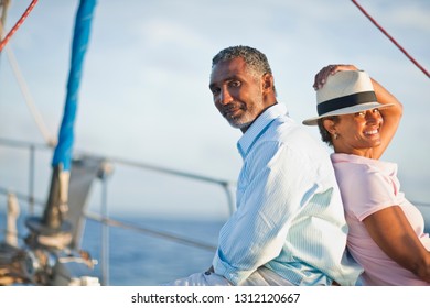 Portrait Of Mature Couple On Boat Deck.