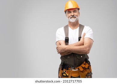 portrait of mature happy handyman isolated on white background