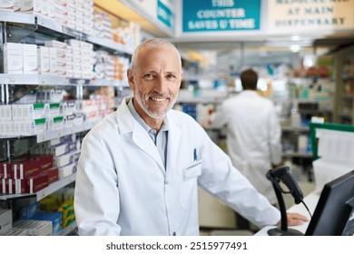 Portrait, mature and happy man at pharmacy on computer for healthcare, service or medicine. Pharmacist, face or medical professional in drugstore for stock, sales and online email at checkout counter - Powered by Shutterstock