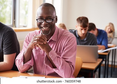 Portrait Of Mature Man Attending Adult Education Class