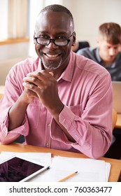 Portrait Of Mature Man Attending Adult Education Class