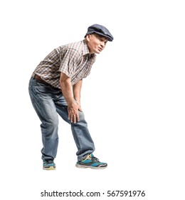Portrait of a mature man with knee pain. Isolated full body on white background with copy space - Shutterstock ID 567591976