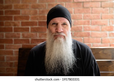 Portrait Of Mature Man With Long Gray Beard