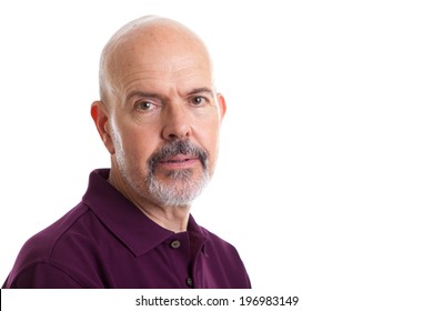 Portrait Of Mature Man In Purple Polo Shirt Isolated On White