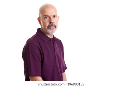 Portrait Of Mature Man In Purple Polo Shirt Isolated On White