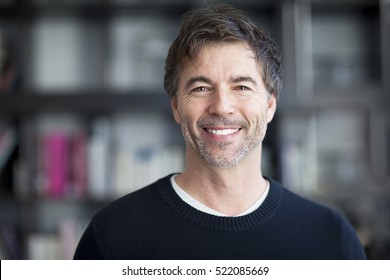 Portrait Of A Mature Man Smiling At The Camera.