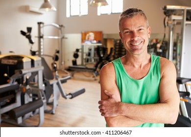 Portrait Of Mature Man Standing In Gym