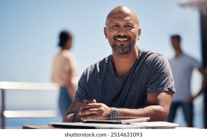 Portrait, mature man and tablet with smile in France for travel, business and break on weekend. Male person, happy and beach promenade with technology for relax, calm and peace at cafe in connection - Powered by Shutterstock