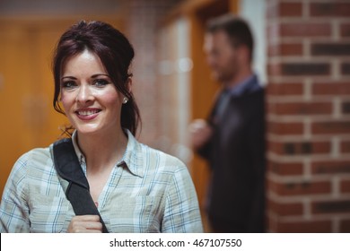 Portrait of mature student standing in the corridor - Shutterstock ID 467107550