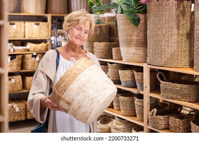 Portrait Of Mature Woman Buying Storage Basket In A Household Goods Store