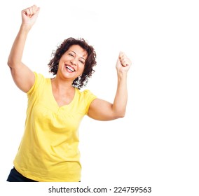 portrait of a mature woman doing a winner gesture