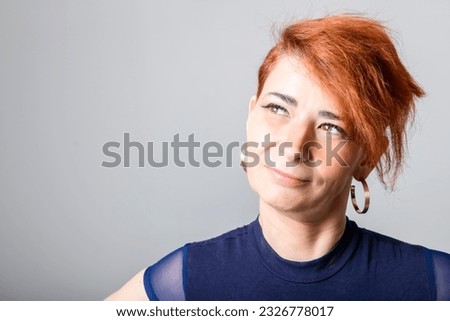 A Portrait of a mature woman on studio background