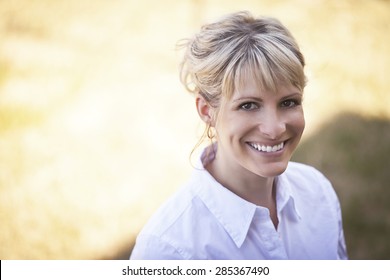 Portrait Of A Mature Woman Smiling Outside