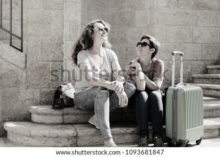 Portrait of mature women traveling together, have fun, smiling, lovely moments. Best friends.