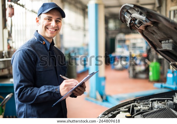 Portrait Mechanic Work His Garage Stock Photo (Edit Now) 264809618