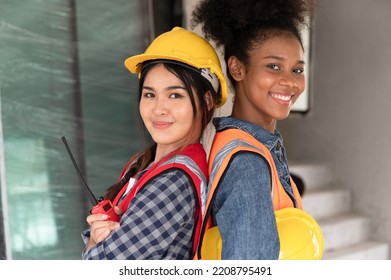 Portrait Mechanical Engineer Woman On Construction Home Building Site	