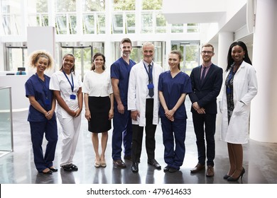 Portrait Of Medical Staff Standing In Lobby Of Hospital - Shutterstock ID 479614633