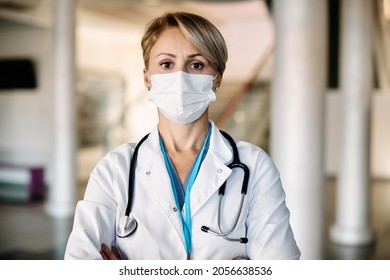 Portrait Of Medical University Professor Wearing Face Mask And Looking At Camera.