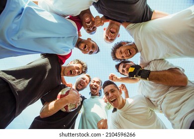 Portrait Men cheering together outdoors - Powered by Shutterstock