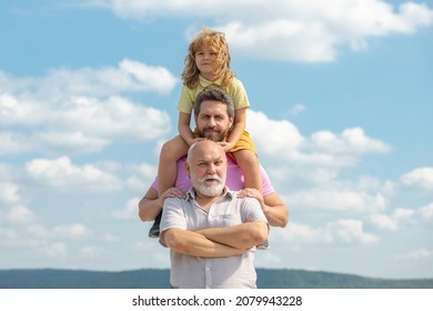 Portrait Of Men Generation Grandfather Father And Grand Son Outdoor On Sky. Fathers Day Concept. Men In Different Ages.