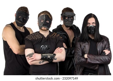 Portrait Of The Metal Band In Masks On White Background