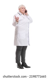 Portrait Of Middle Aged Female Doctor Talking With Somebody On Her Mobile Phone.