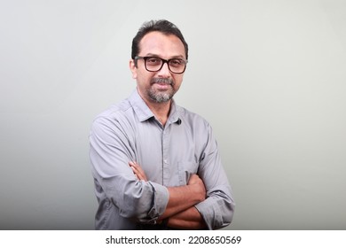 Portrait Of A Middle Aged Happy Man Of Indian Origin